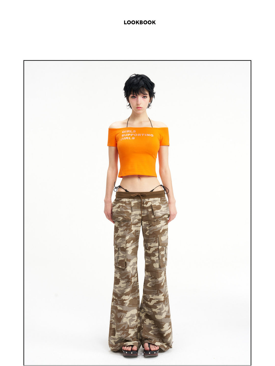 NEXT PASSPORT camouflage ribbed-waist flared pants — centered lookbook view showing the full silhouette.