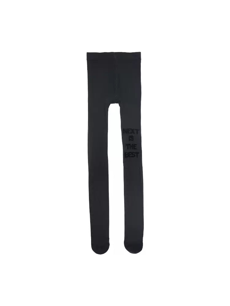 NEXT PASSPORT black flocked-letter tights flat lay