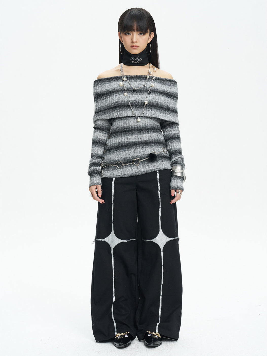 NEXT PASSPORT black silver-cross sequin wide-leg pants — straight-on full-length look.