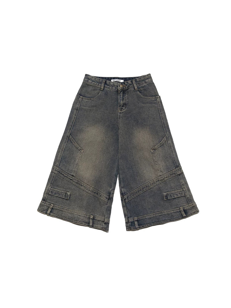 Flat lay of NEXT PASSPORT deconstructed wide-leg denim capri pants