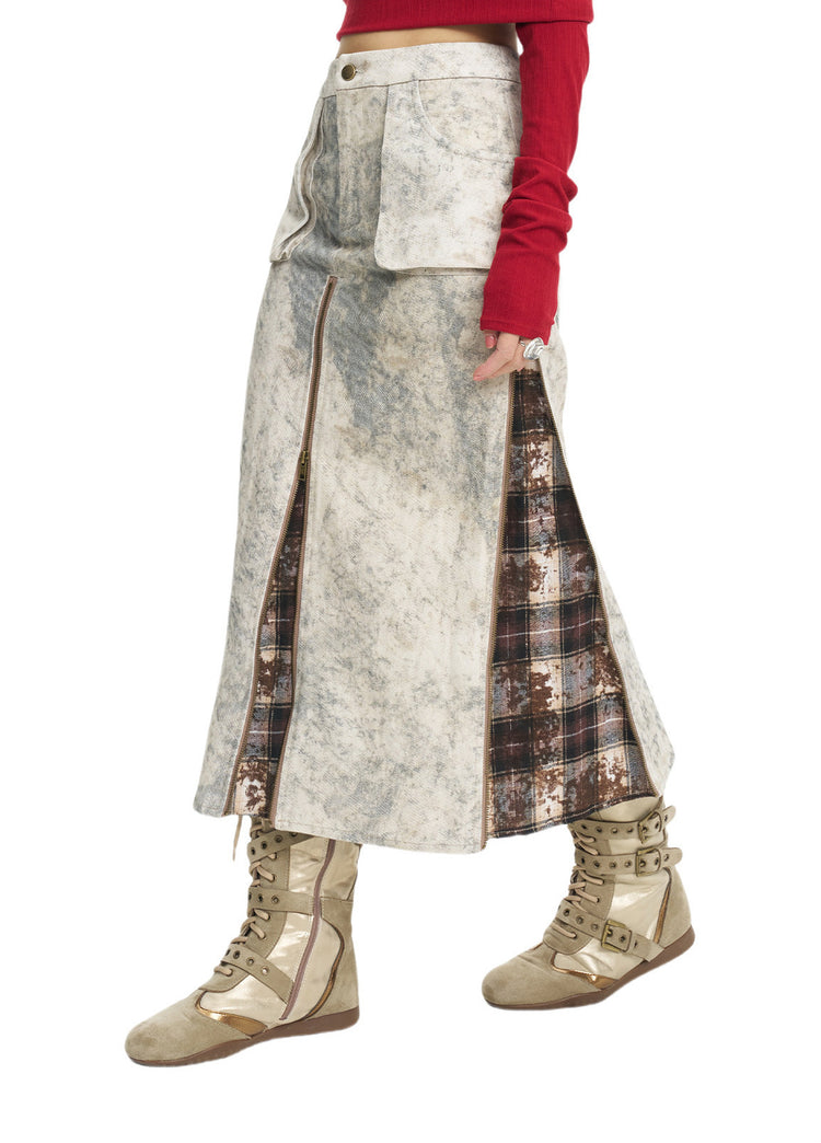 Close side view showing the plaid panels and long zippers
