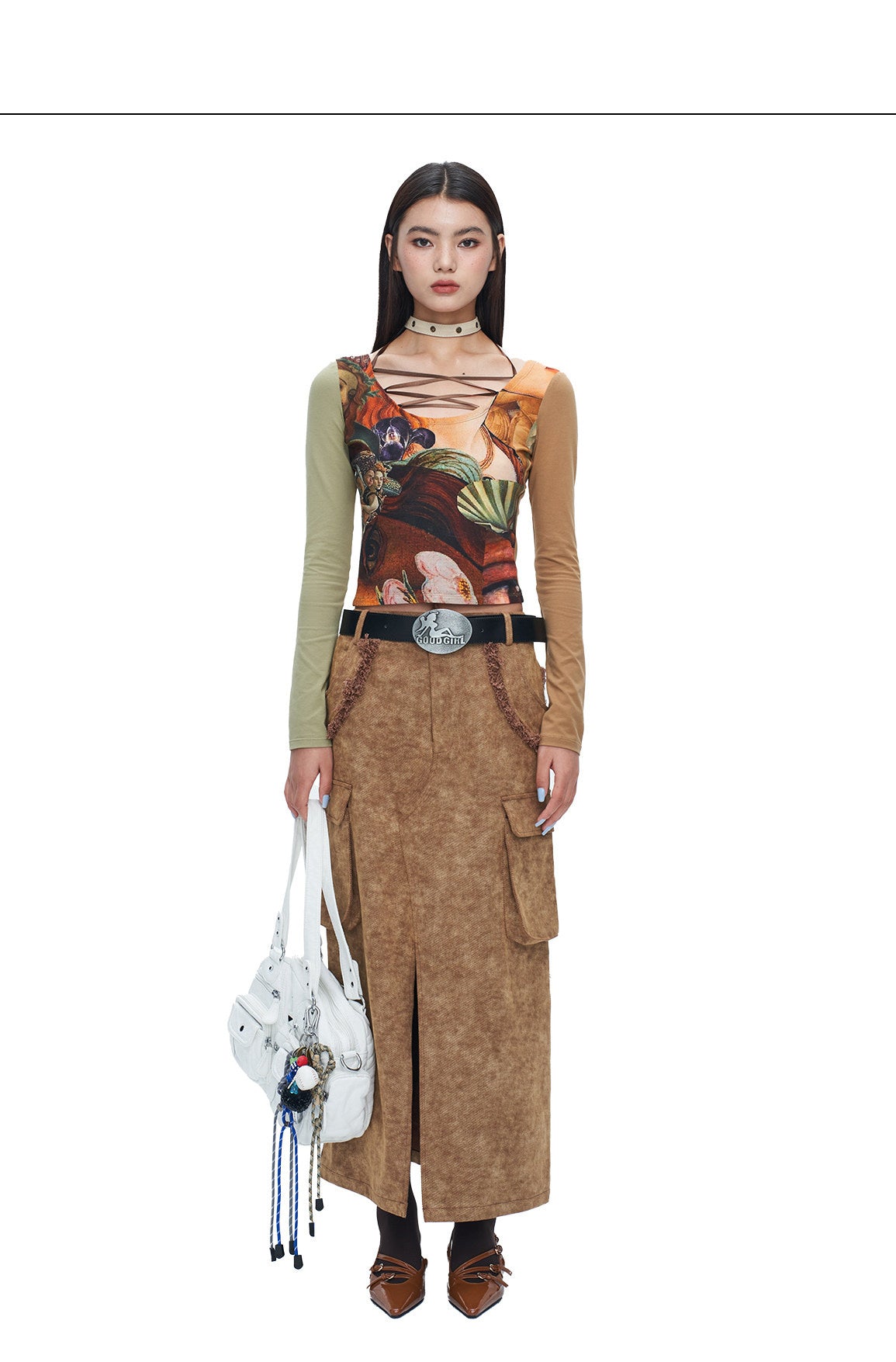 Full front studio view of NEXT PASSPORT brown raw-edge slit denim maxi skirt