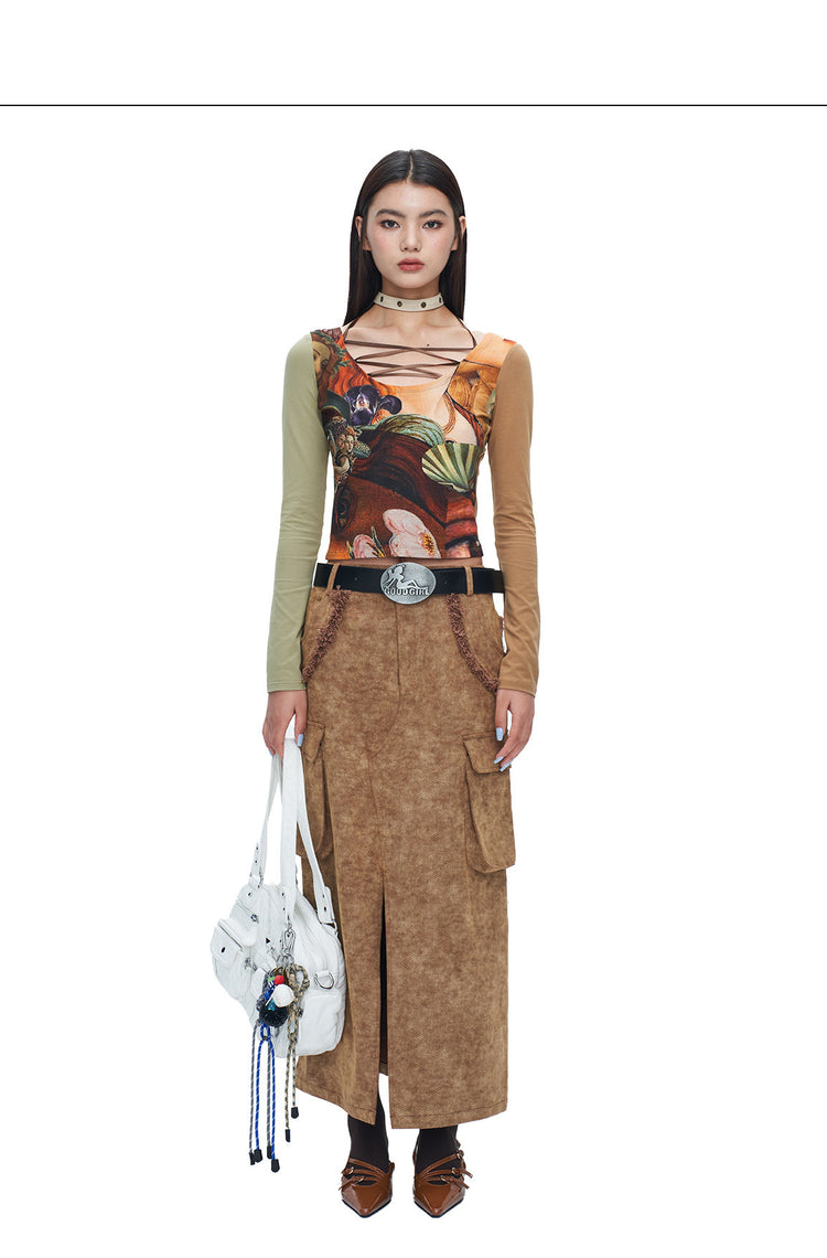 Full front studio view of NEXT PASSPORT brown raw-edge slit denim maxi skirt
