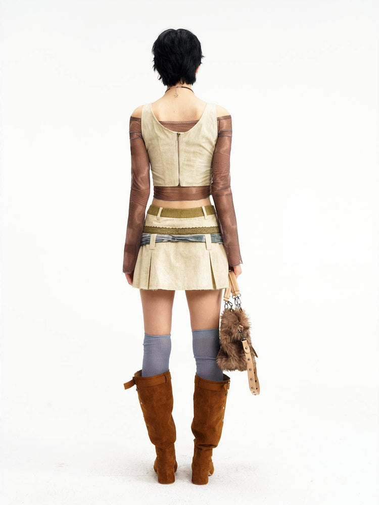 Back view showing the vest zipper and skirt pleats