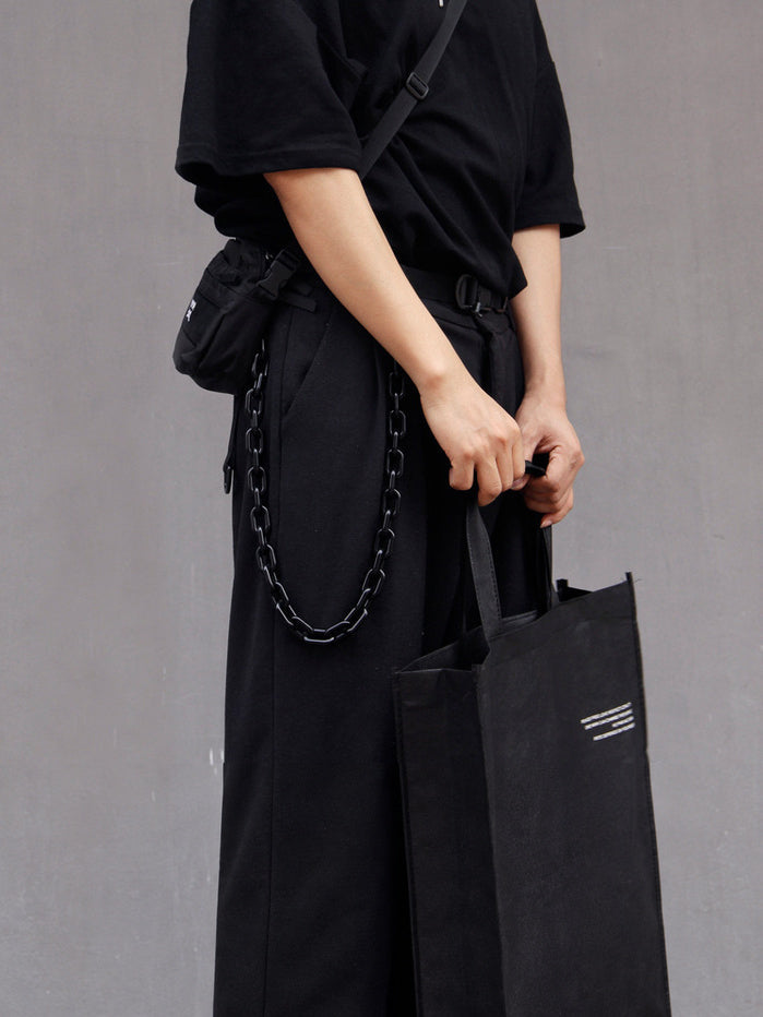 COLLATERAL — black resin trouser chain styled with black trousers, legacy modeled view
