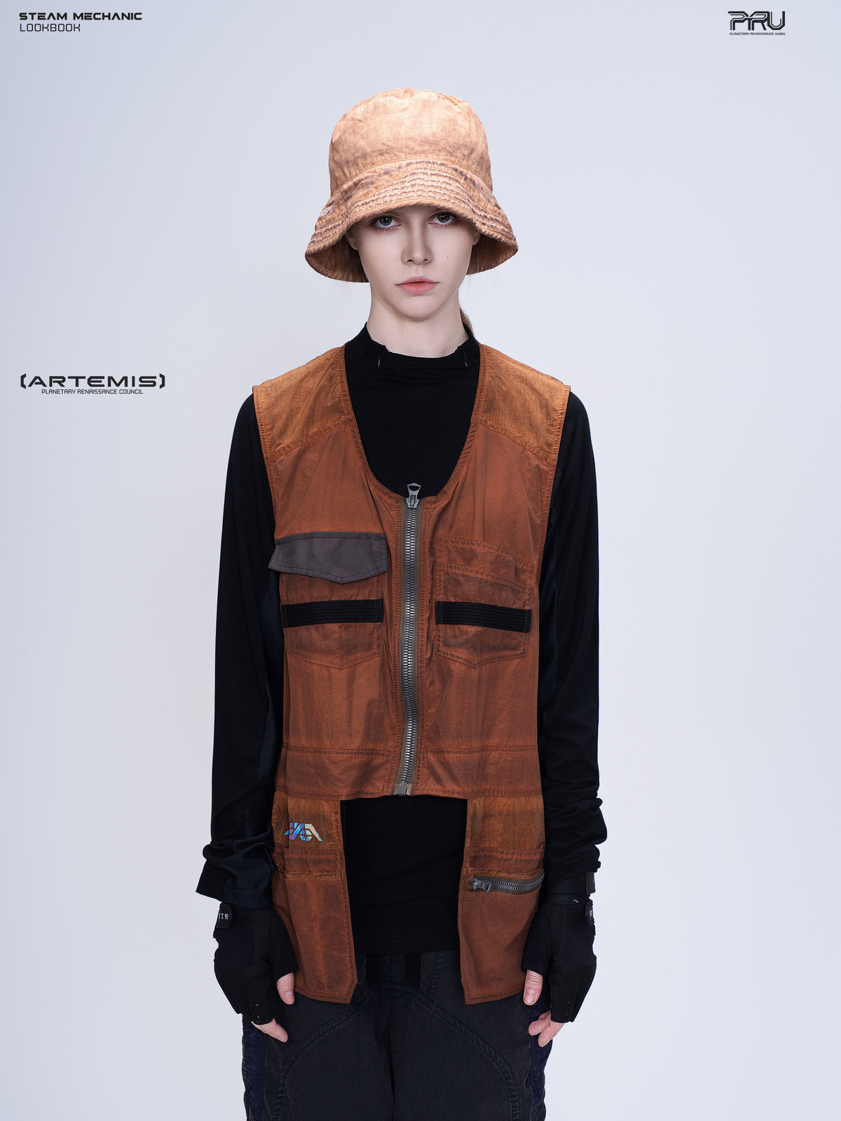 PIONEER sedna-red multi-pocket vest, front view styled with a bucket hat and dark inner layer