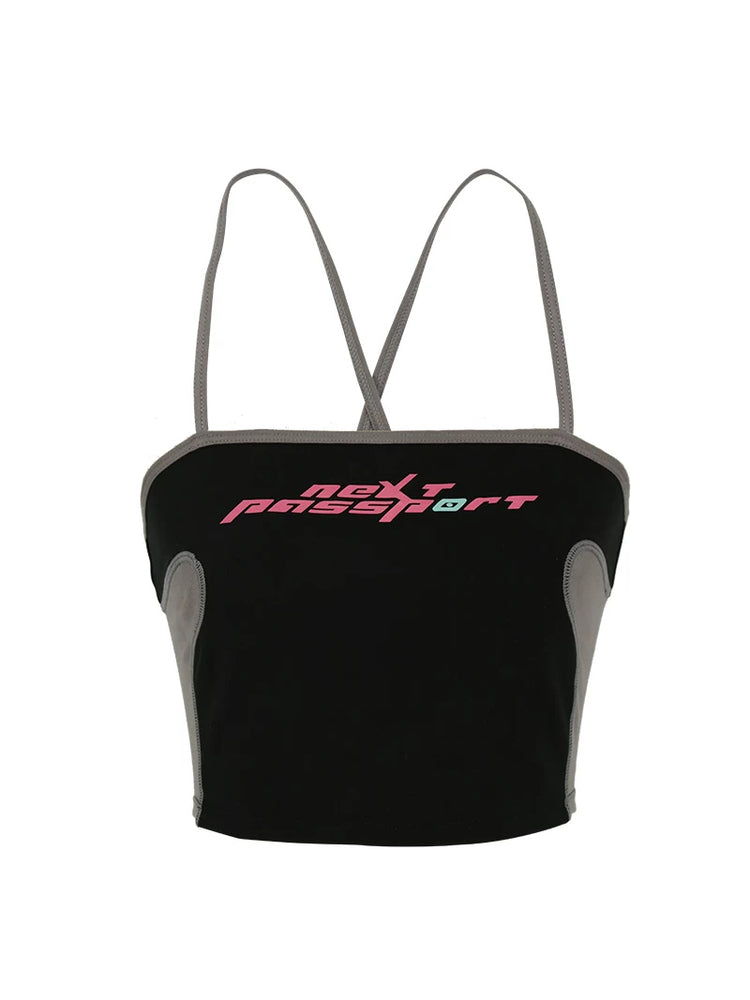 NEXT PASSPORT RETROFUTURE color-block crop camisole — black garment-only front view with gray side panels and pink chest logo.