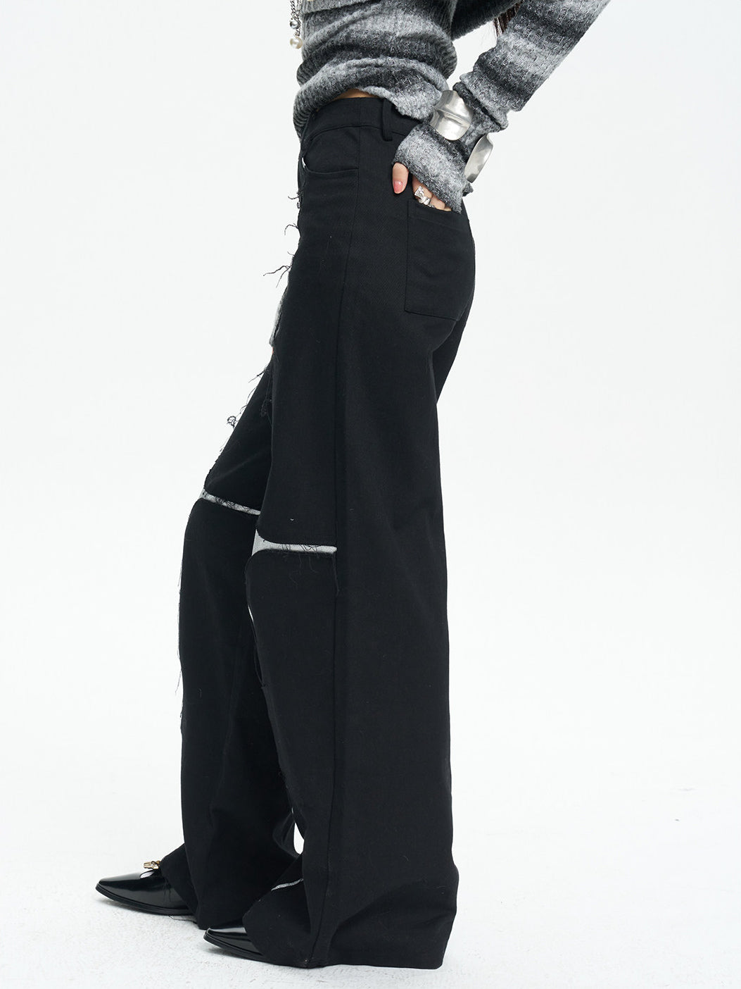 NEXT PASSPORT black silver-cross sequin wide-leg pants — side and back-pocket view.