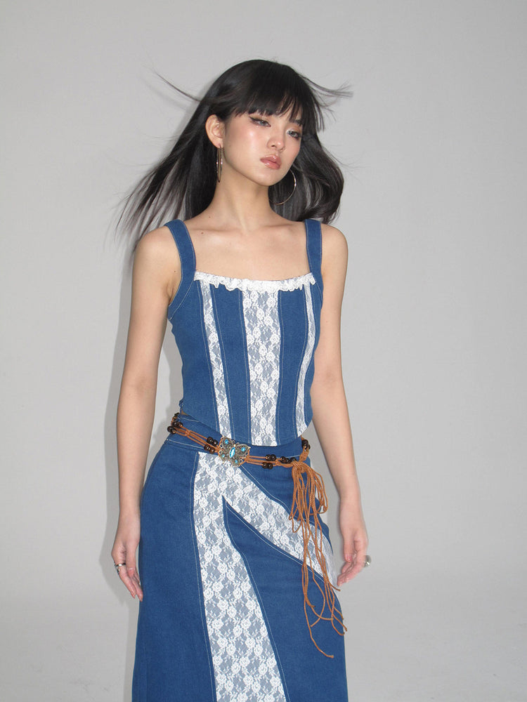 NEXT PASSPORT blue lace-panel denim midi skirt — flash-lit front view.