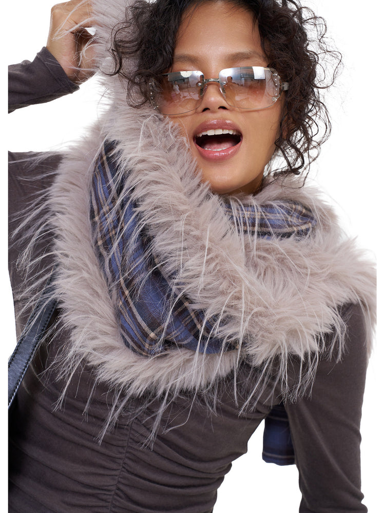 NEXT PASSPORT blue-purple plaid faux-fur scarf — close modeled detail of the soft faux-fur edge