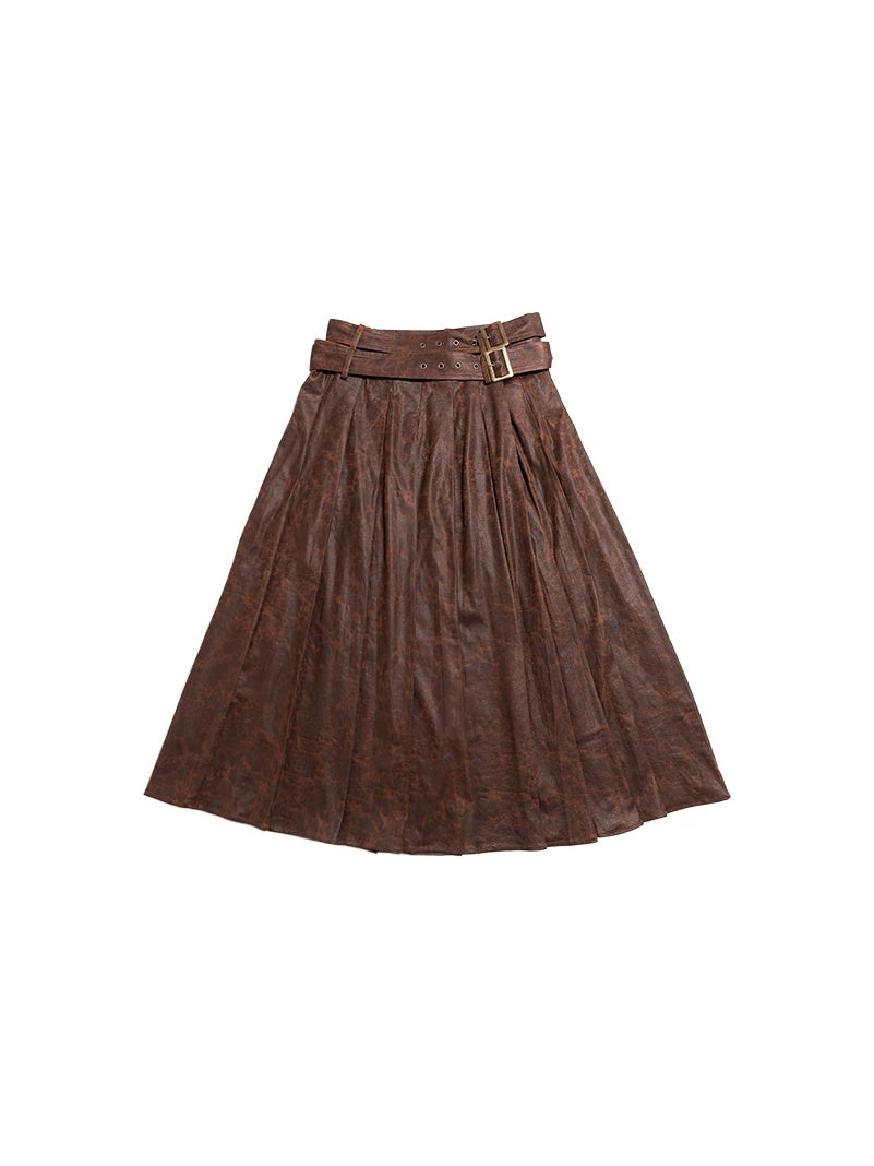 Brown faux-suede pleated wrap maxi skirt flat lay on white