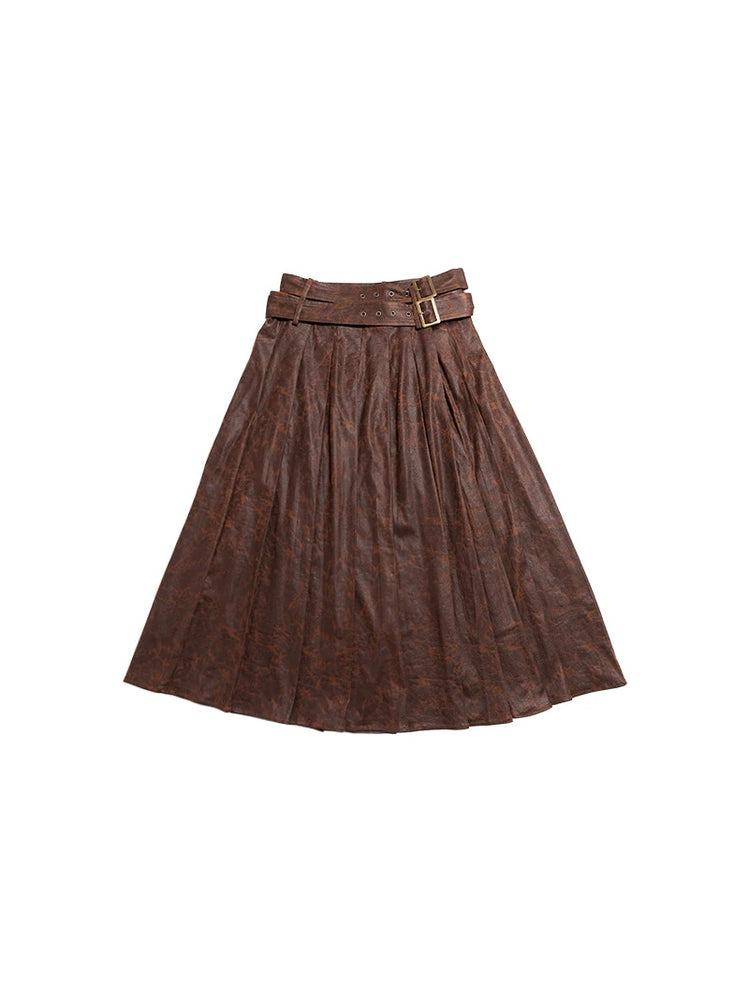 Brown faux-suede pleated wrap maxi skirt flat lay on white