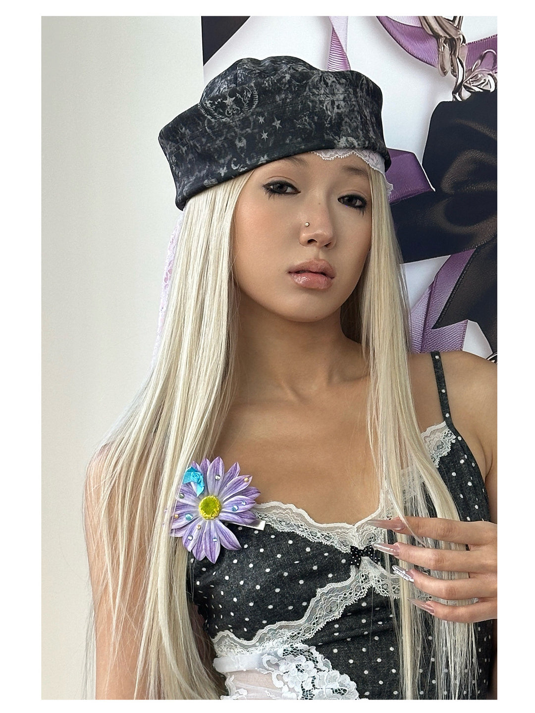 4RE1GN MYSTIC printed brimless hat — black-gray mystic print — modeled close-up beside a bow display