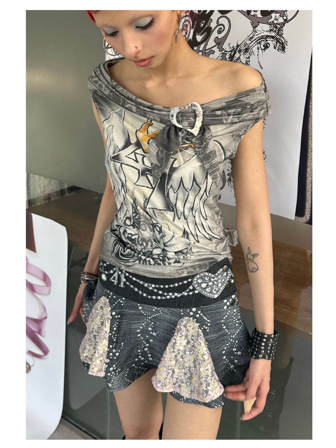 4RE1GN JEWEL denim-print lace mini skirt in black multicolor — close modeled view looking down at the layered hem