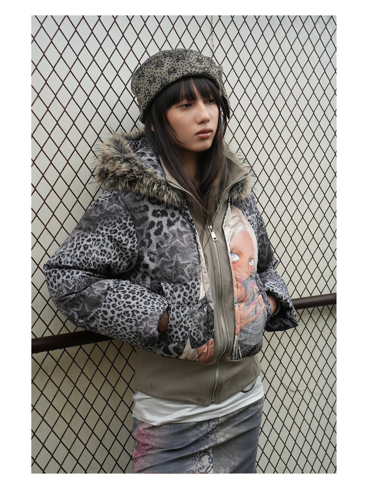 4RE1GN NAILS DONE leopard graphic down jacket in gray multicolor — close modeled view showing the collar and pocket opening