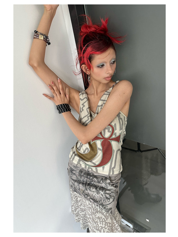 4RE1GN SIGIL cowl-neck halter top in ivory multicolor — three-quarter modeled view with one arm raised