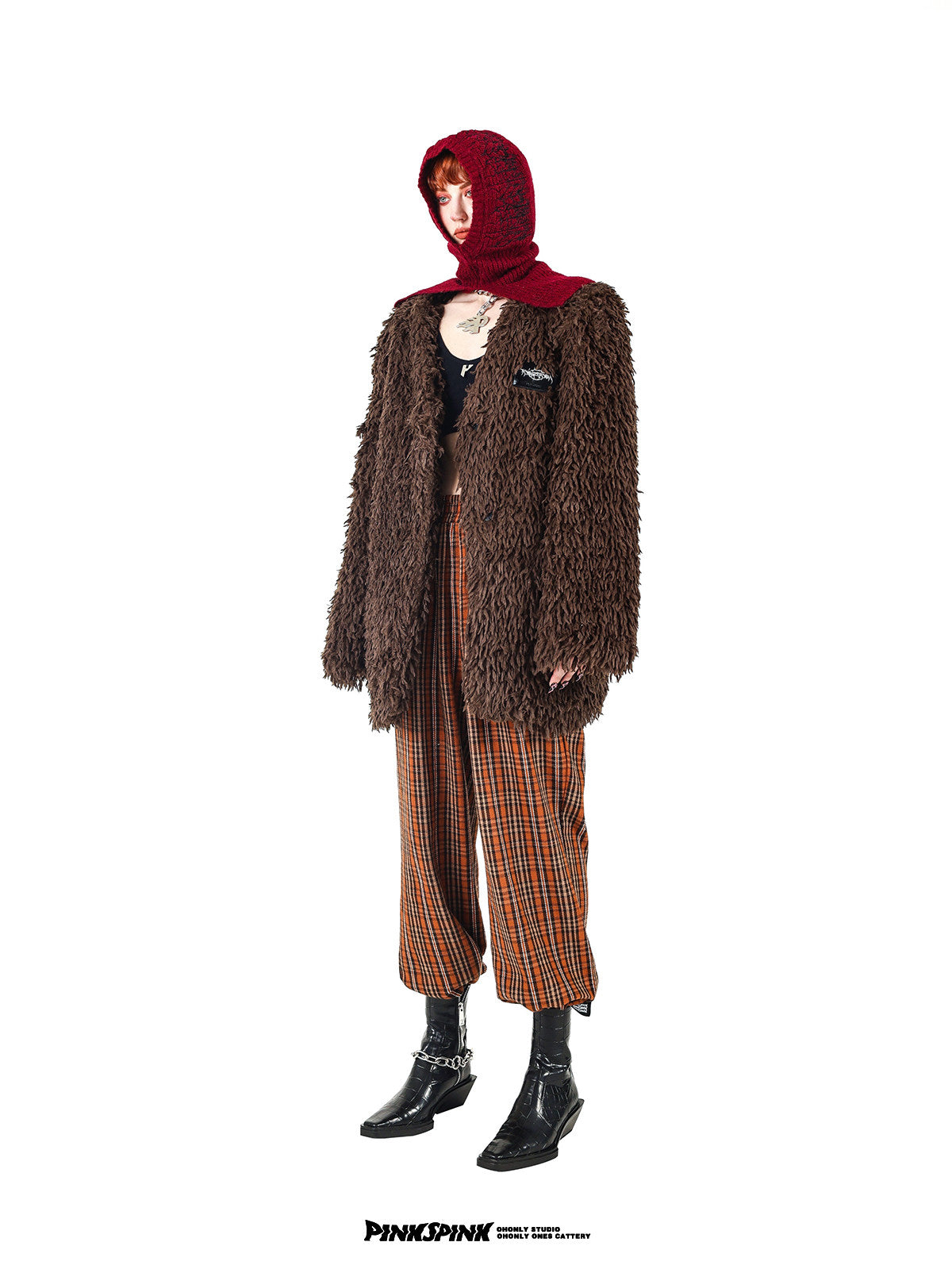 PINKSPINK caramel shaggy padded-shoulder jacket — side modeled view with long sleeves