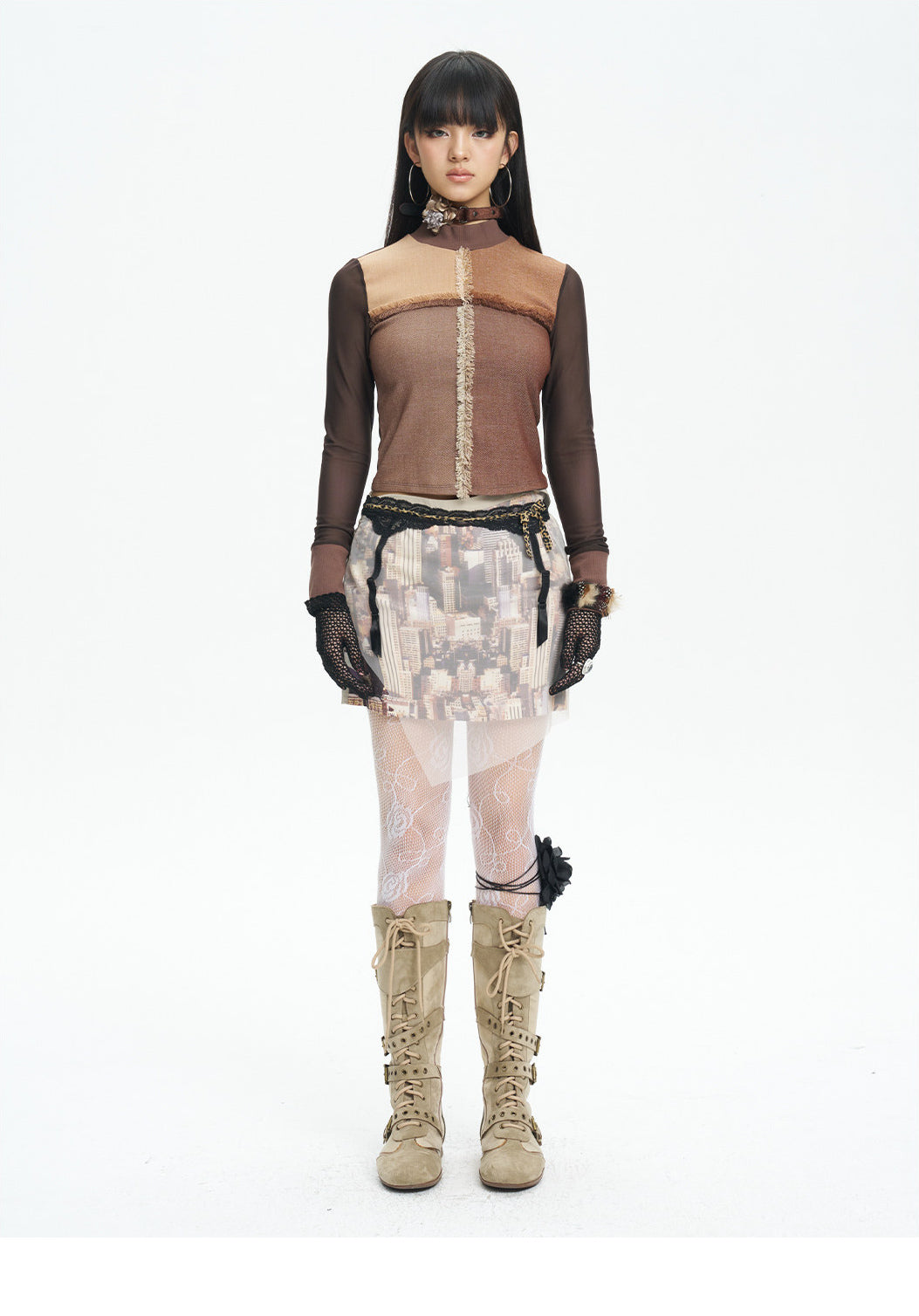 NEXT PASSPORT HAZY CITY mesh double-waist mini skirt — three-quarter studio view with the mesh overlay in motion.