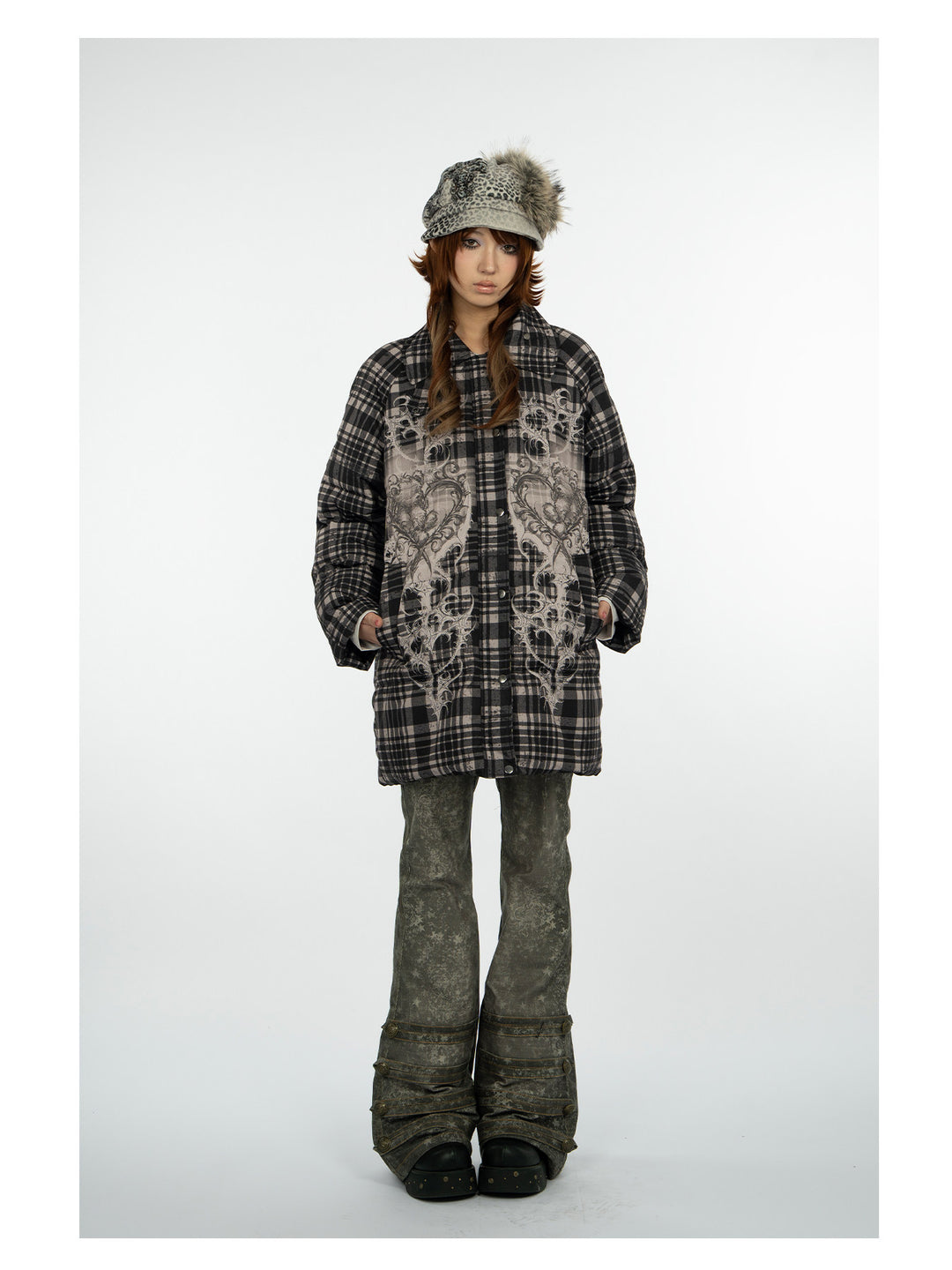 4RE1GN BEARHEART plaid long down coat in brown multicolor — full-length modeled view with the furry collar removed and printed trousers