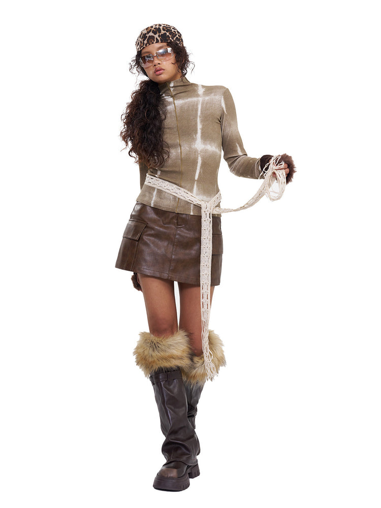 NEXT PASSPORT brown fitted mock-neck long-sleeve tee studio styling view with handbag.