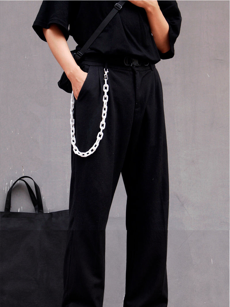 COLLATERAL — white resin trouser chain styled with black trousers, legacy modeled view