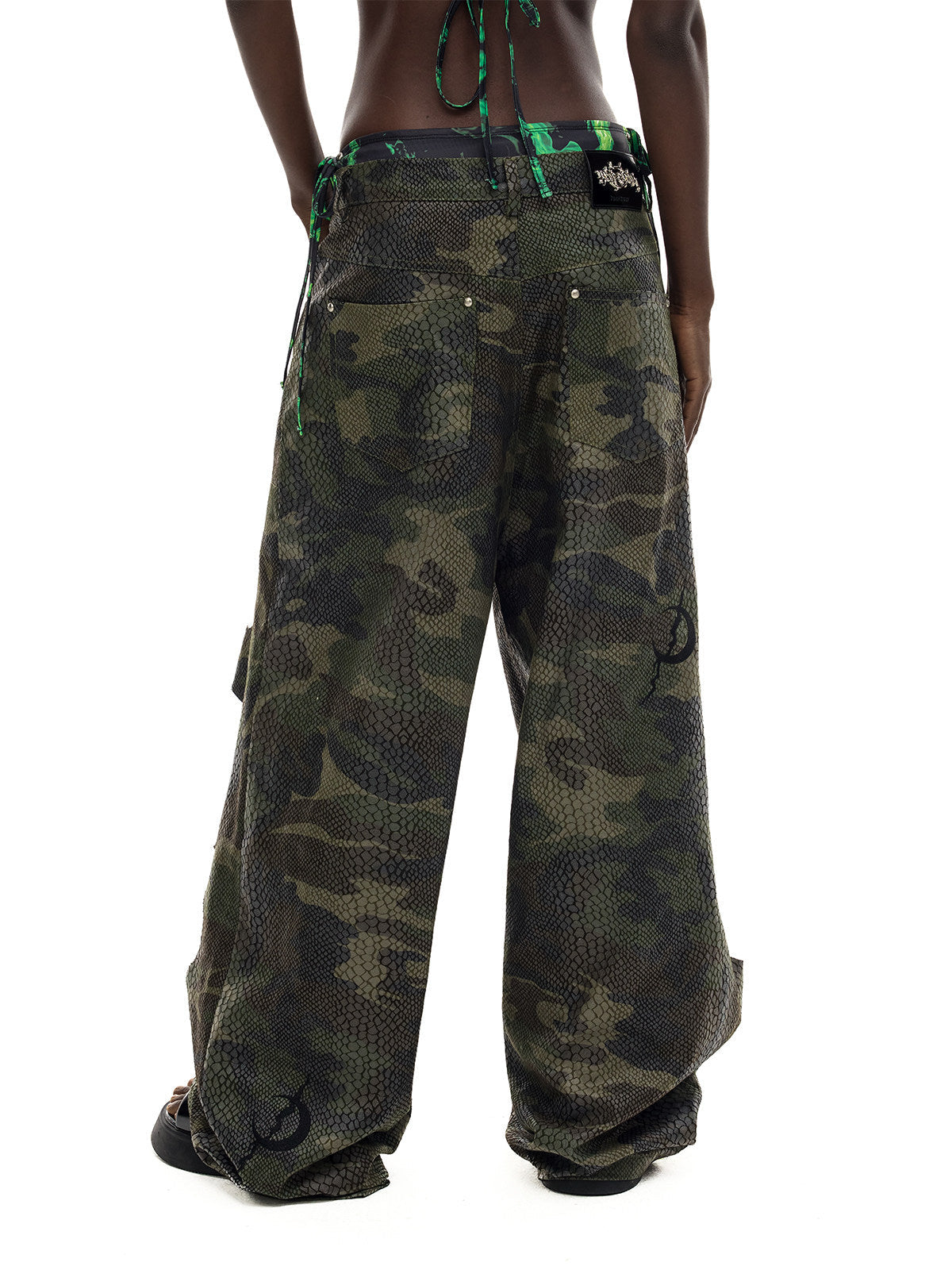 PINKSPINK DOUBLE STACK distressed camouflage wide-leg jeans — back waist-to-hem modeled view showing the camouflage and wide fit