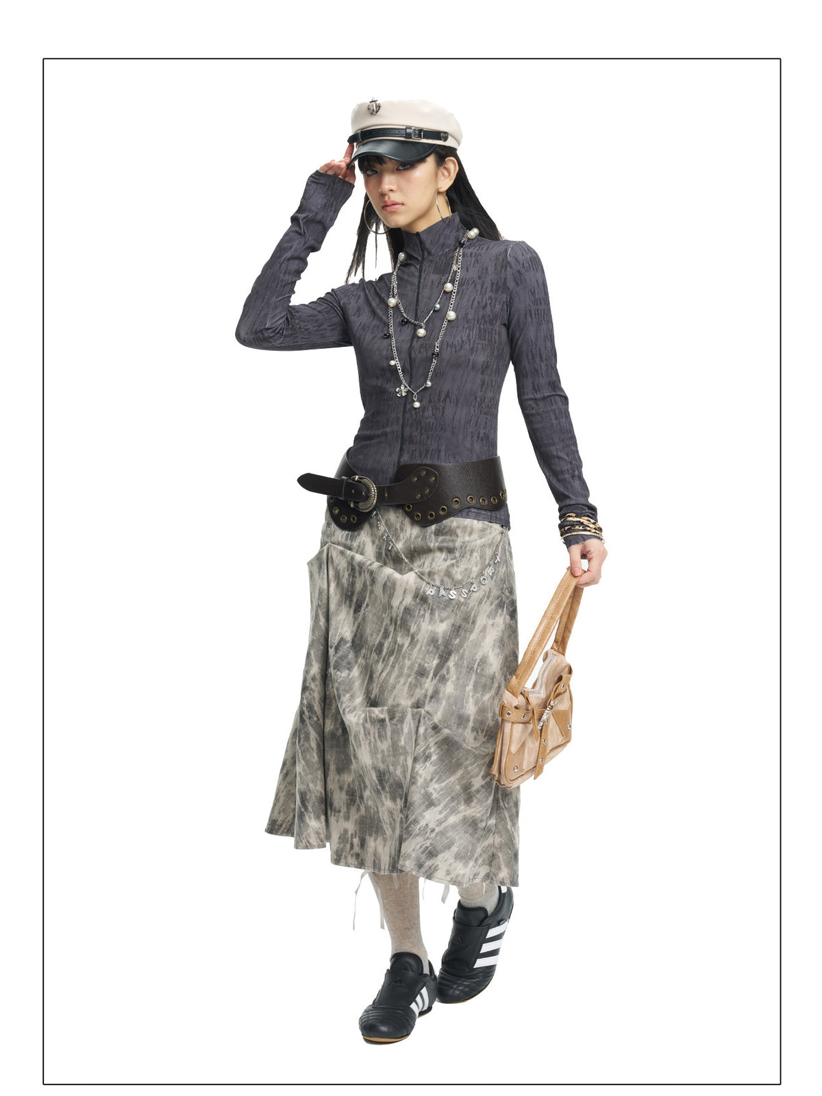 NEXT PASSPORT dark gray fitted mock-neck long-sleeve tee styled with a midi skirt.