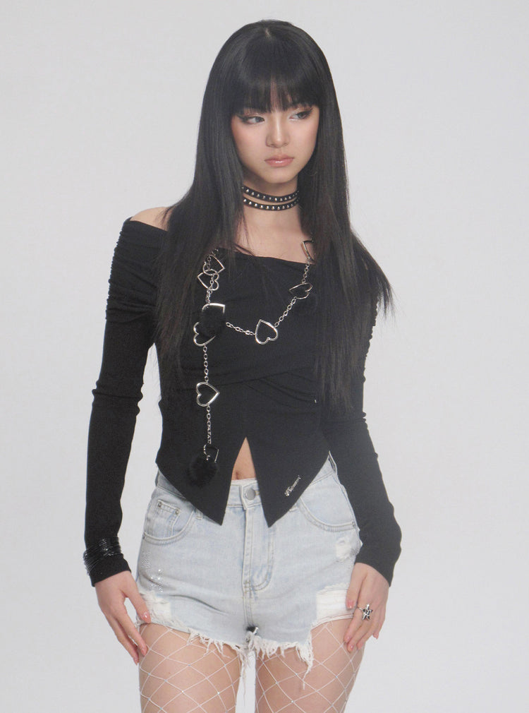 NEXT PASSPORT distressed fringe denim shorts in denim blue — close front modeled view emphasizing the fringe hem.