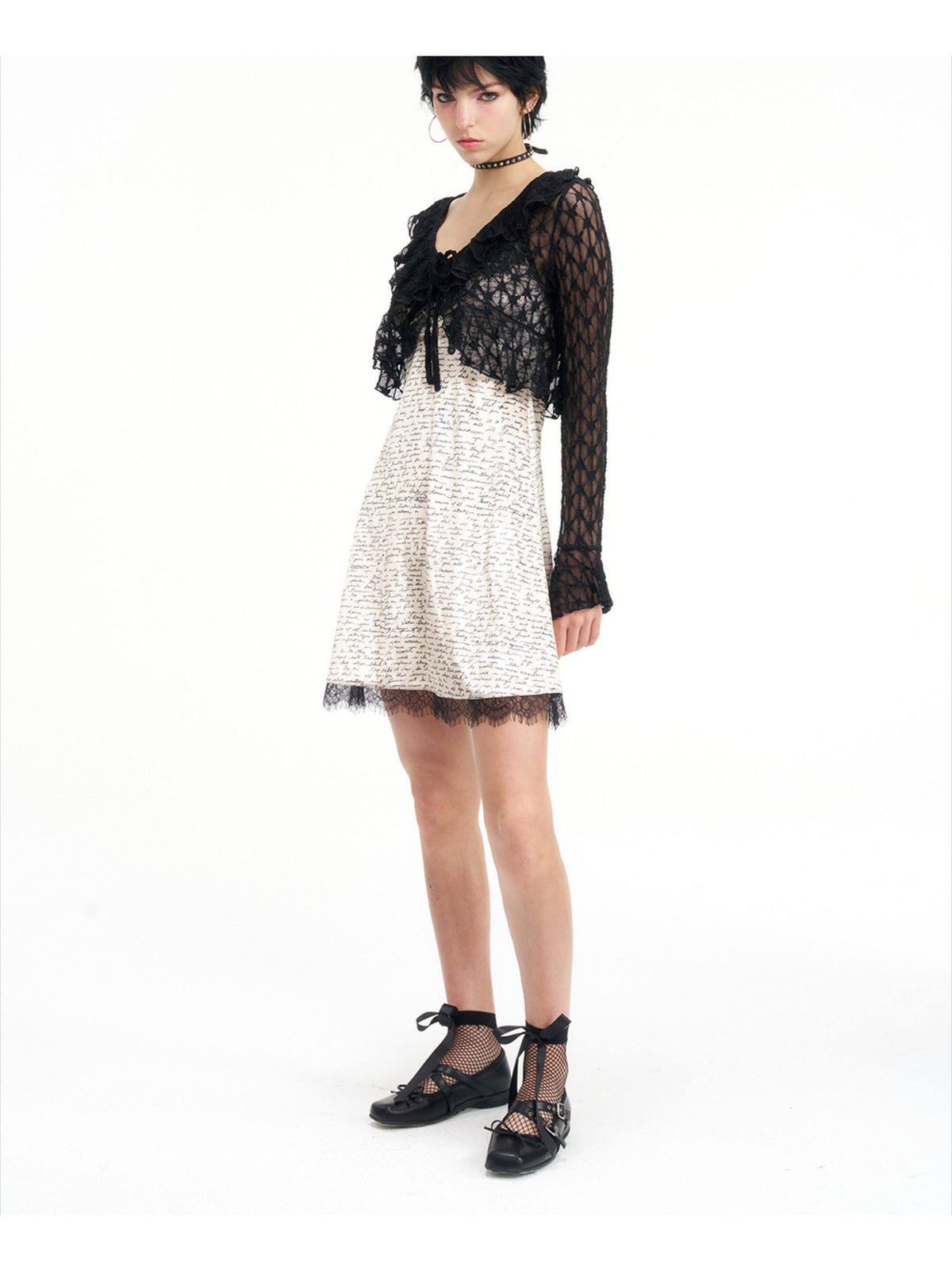 NEXT PASSPORT black lace cropped cardigan — side layering view.