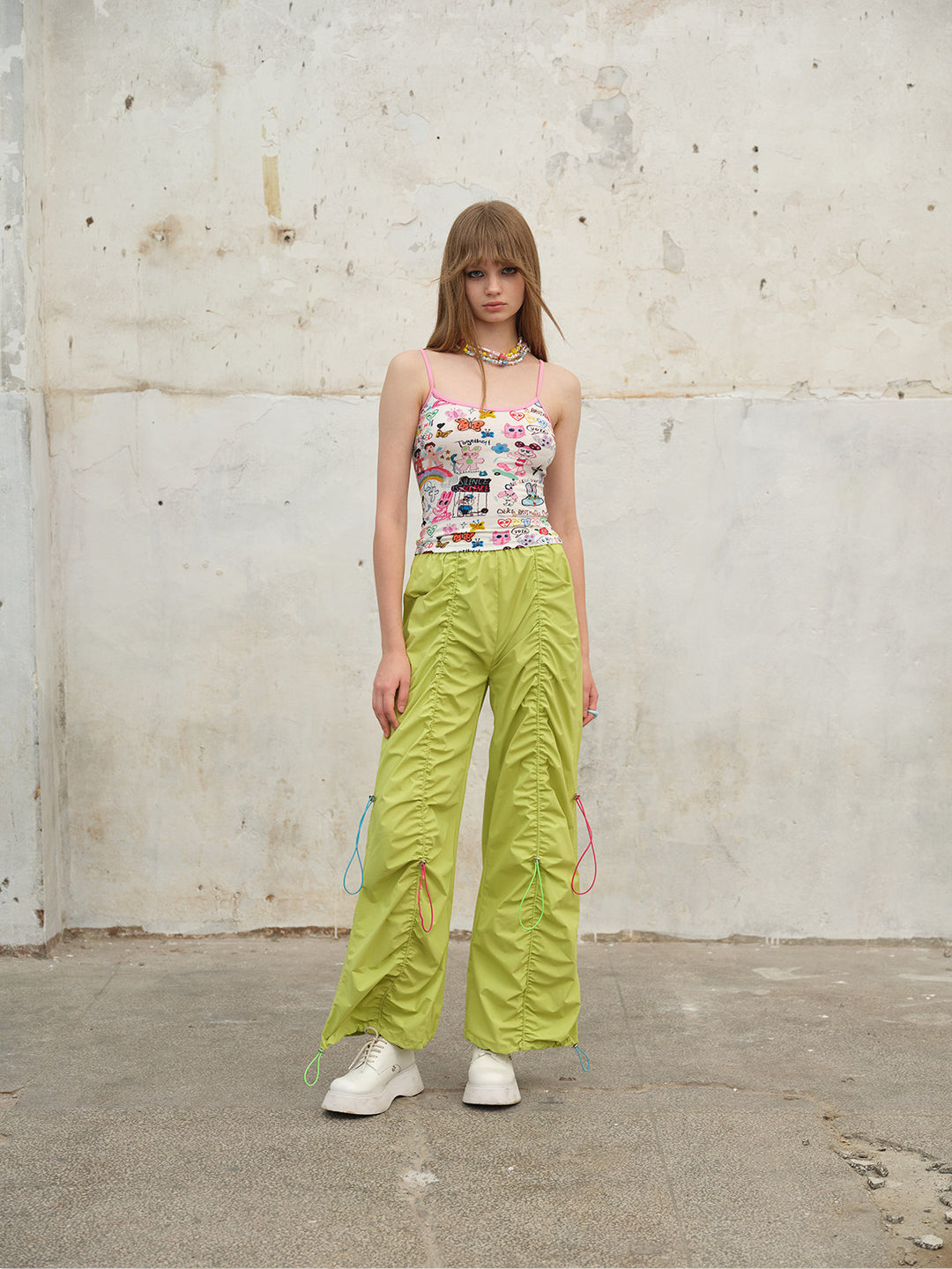 NEXT PASSPORT three-color ruched drawstring wide-leg pants in green, full-length view