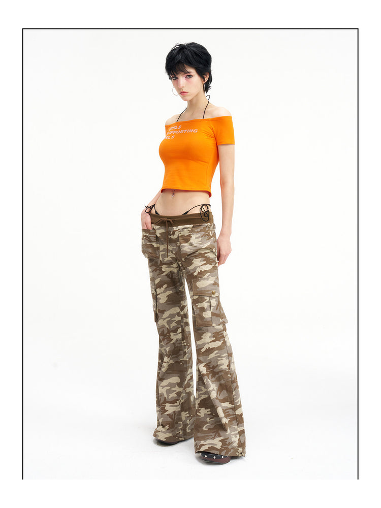 NEXT PASSPORT camouflage ribbed-waist flared pants — full-length three-quarter studio view.