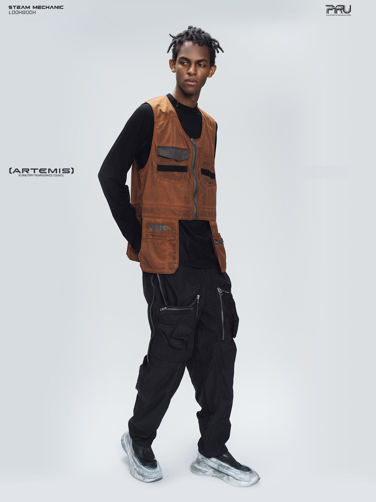 PIONEER sedna-red multi-pocket vest, full-length angled pose with hand resting at hip
