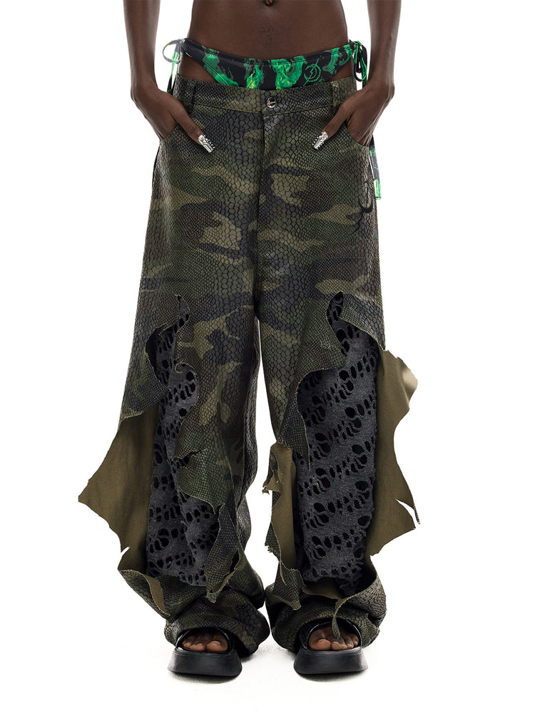 PINKSPINK DOUBLE STACK distressed camouflage wide-leg jeans — front waist-to-hem modeled view showing the distressed inserts