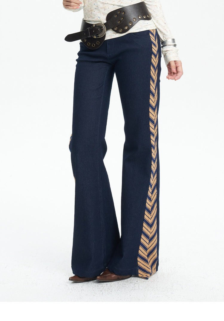 NEXT PASSPORT striped tie-panel flared pants in denim blue — striped side-panel detail.