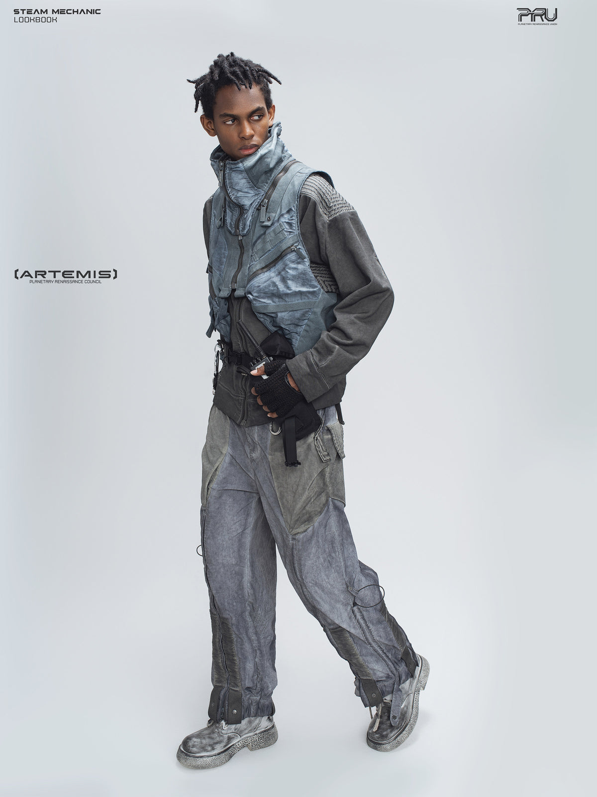 FISSION modular vest in star blue, full-body side pose showing the cropped silhouette