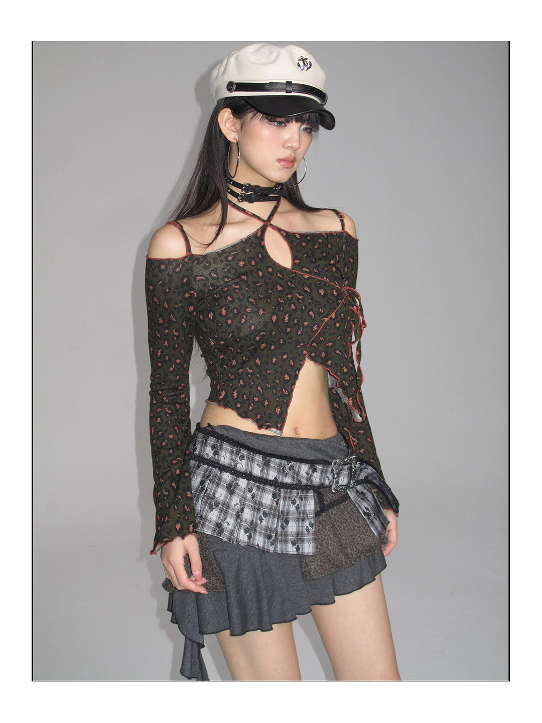 Three-quarter studio view of the leopard-print long-sleeve top
