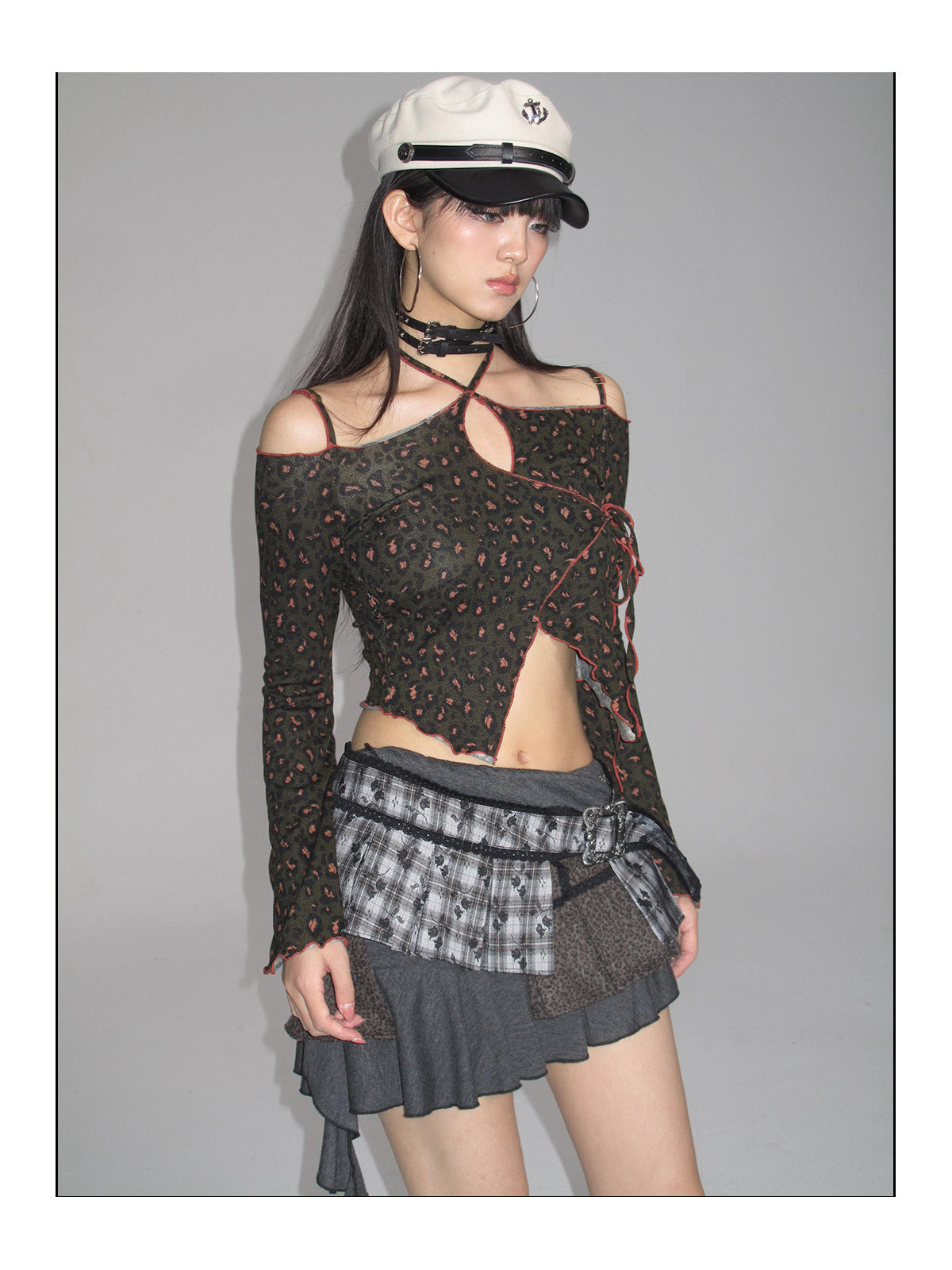 Three-quarter studio view of the leopard-print long-sleeve top