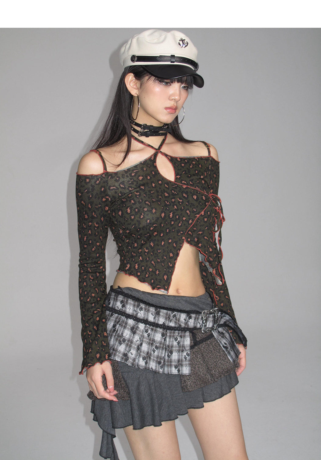 Three-quarter studio view of the leopard-print long-sleeve top