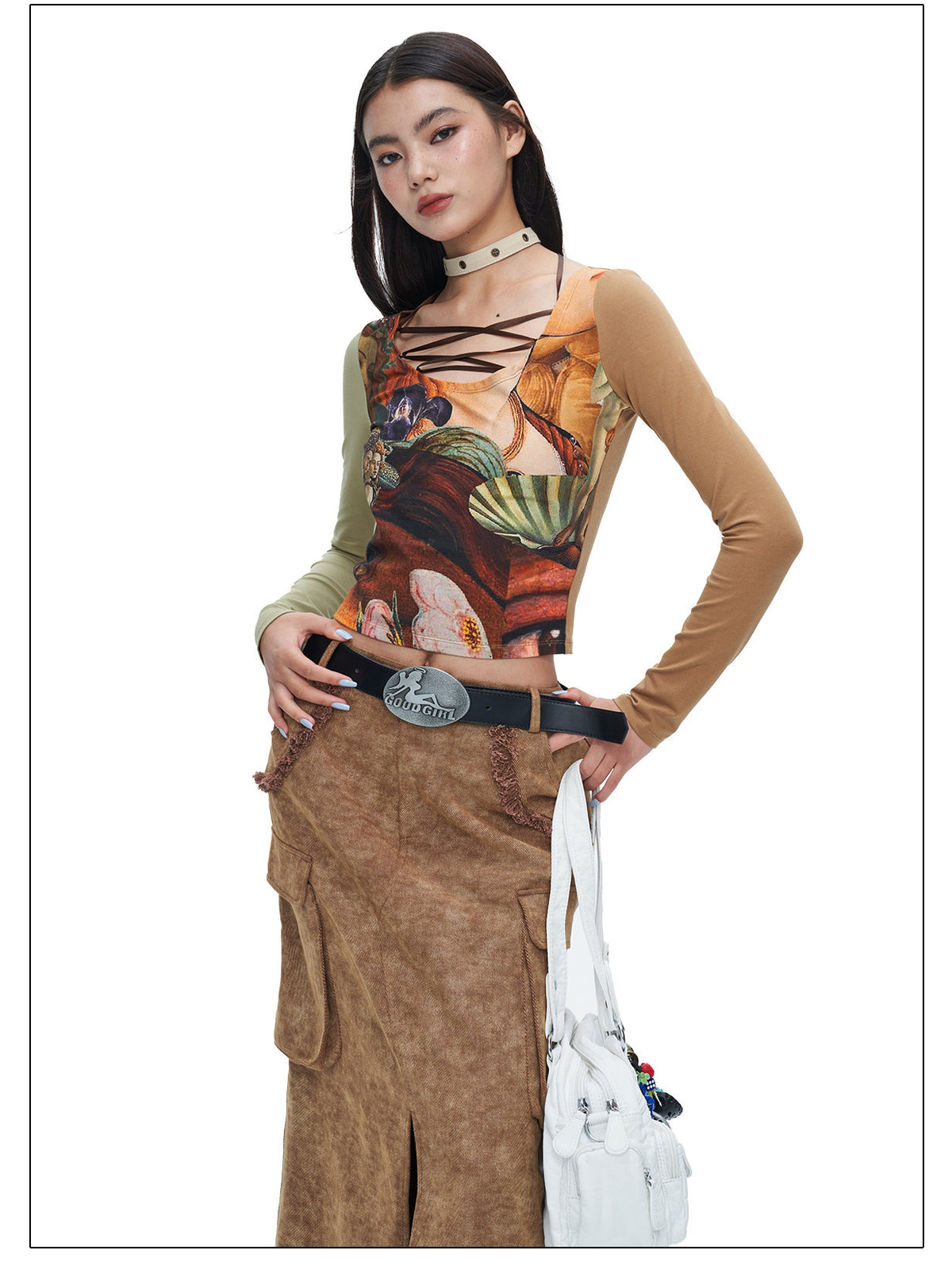 Waist and cargo-pocket detail of NEXT PASSPORT brown denim maxi skirt