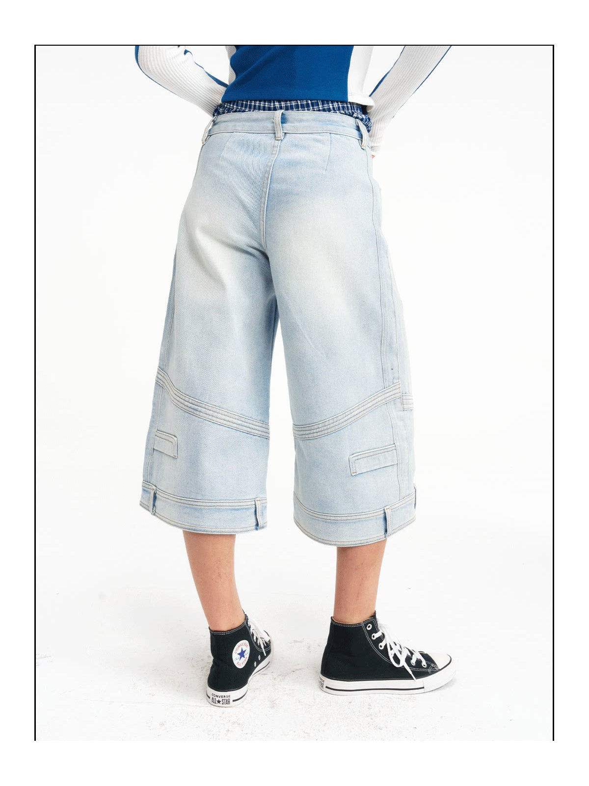 Rear close view of the light-wash cropped jeans