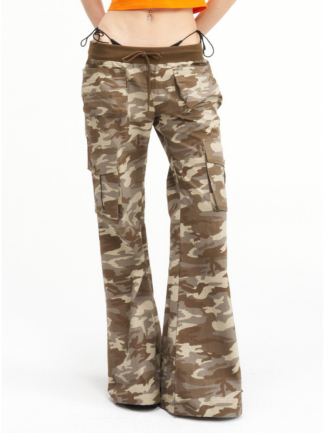 NEXT PASSPORT camouflage ribbed-waist flared pants — waist-down front detail showing the ribbed waistband, pockets and flared legs.
