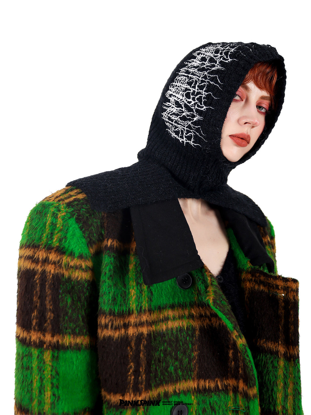 PINKSPINK ELECTRIC THORN embroidered knit balaclava in black — angled modeled close-up with a green plaid coat