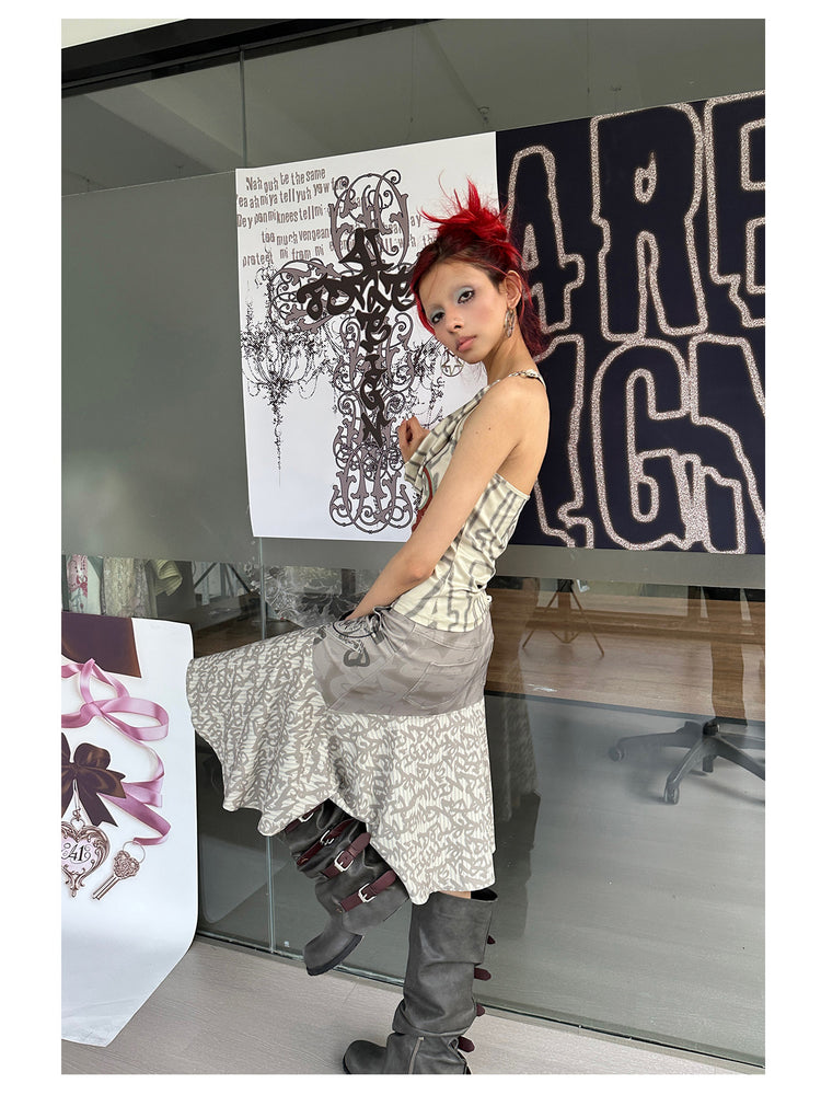 4RE1GN SIGIL cowl-neck halter top in ivory multicolor — side modeled view with one leg raised