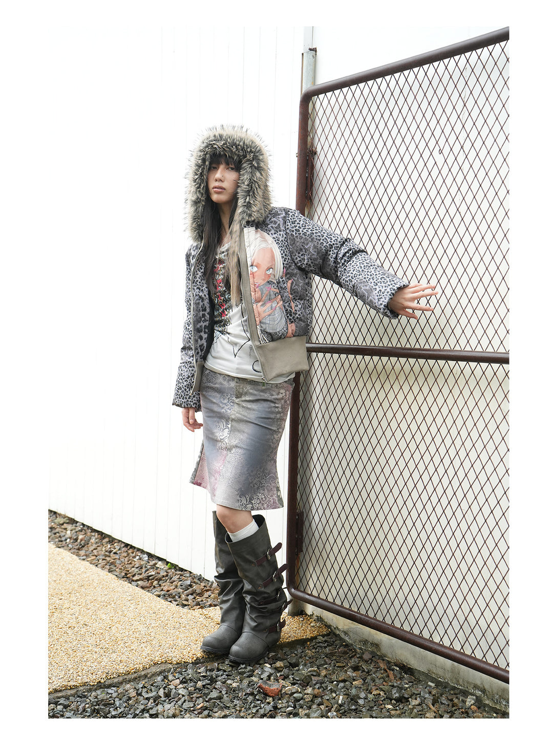 4RE1GN NAILS DONE leopard graphic down jacket in gray multicolor — full-length modeled view with one arm extended