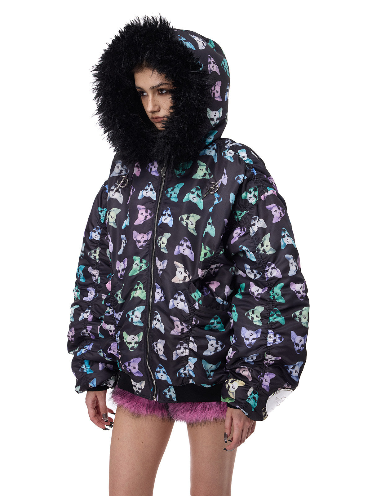 PINKSPINK CAT ALIEN faux-fur collar padded jacket — three-quarter modeled view with the hood up and a mini skirt