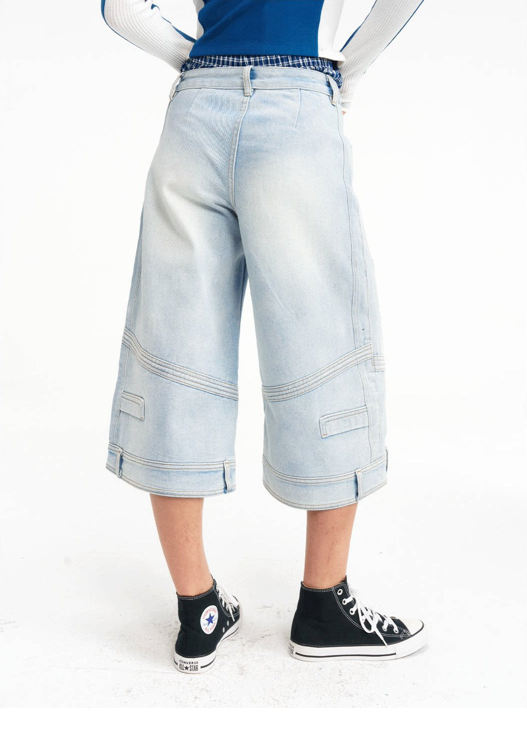 Rear close view of the light-wash cropped jeans