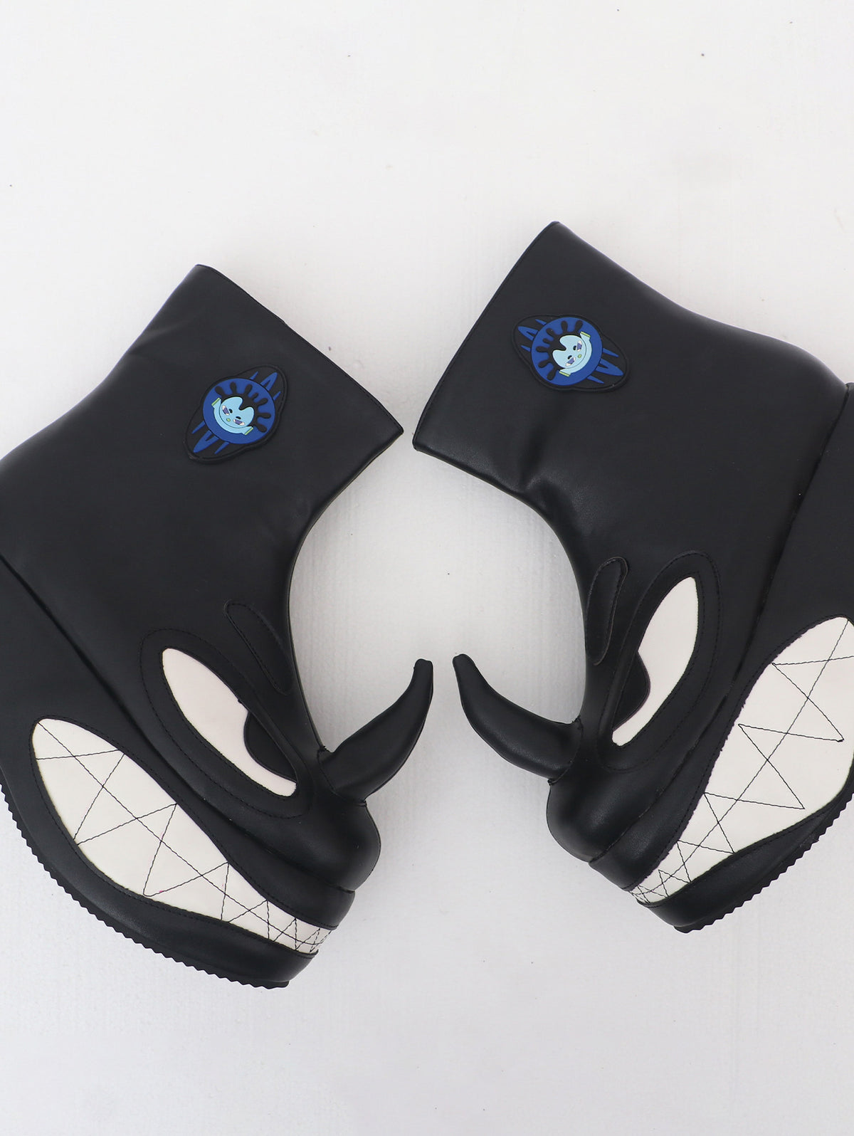 EMBRYO ANGRY horn-toe platform boots — top-down outer view