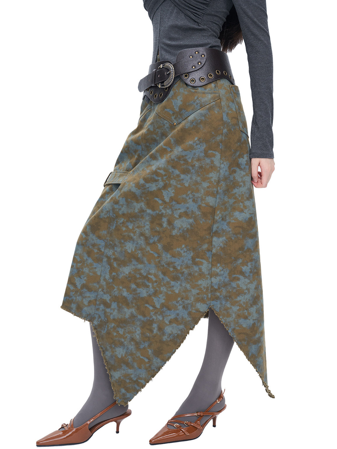 NEXT PASSPORT blue-brown tie-dye asymmetric denim midi skirt — side modeled view showing the asymmetric wrap-like shape.
