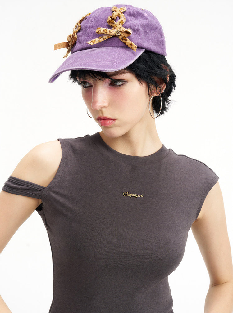 NEXT PASSPORT asymmetric cutout-shoulder sleeveless tee front detail
