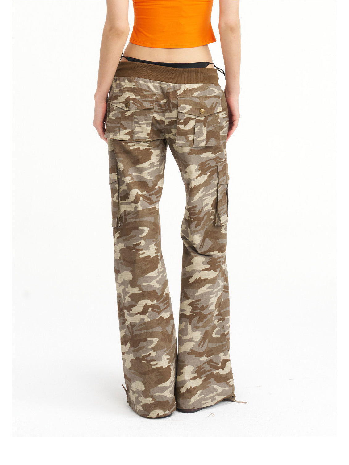 NEXT PASSPORT camouflage ribbed-waist flared pants — waist-down rear detail showing the ribbed waistband and back pockets.